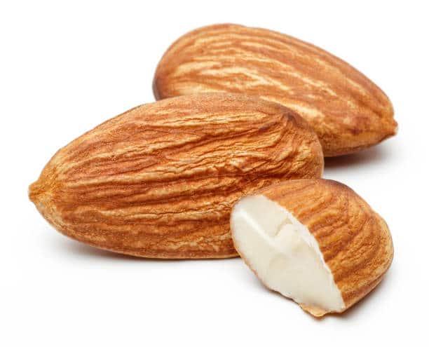 Group of almonds isolated on white background